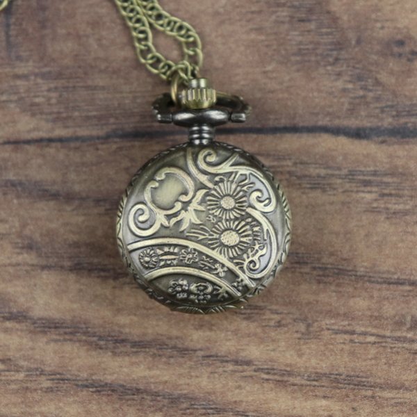 Small pocket watch with tinted glass lid